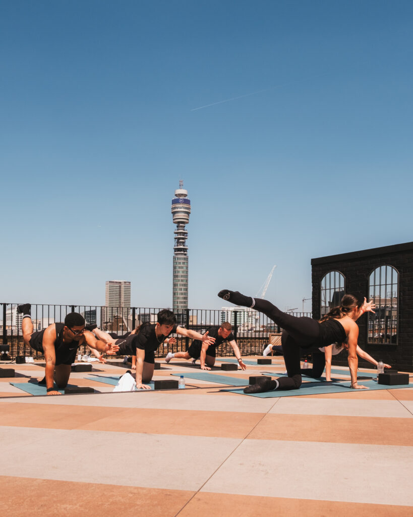 Pilates in the sun by FS8 and F45 - Fitzrovia Quarter Wellness Festival